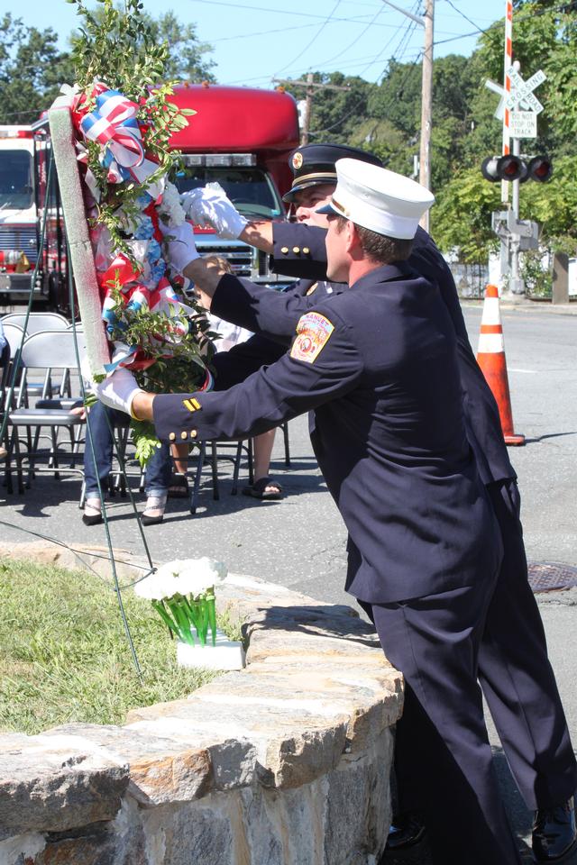 Flower placed for Leo Weishhaar by Matt Bowler. Flower placed for Carmine Albero by Todd Giraudin.

Memorial Service NFD. September 9, 2012. Photo by Vincent P. Tuzzolino